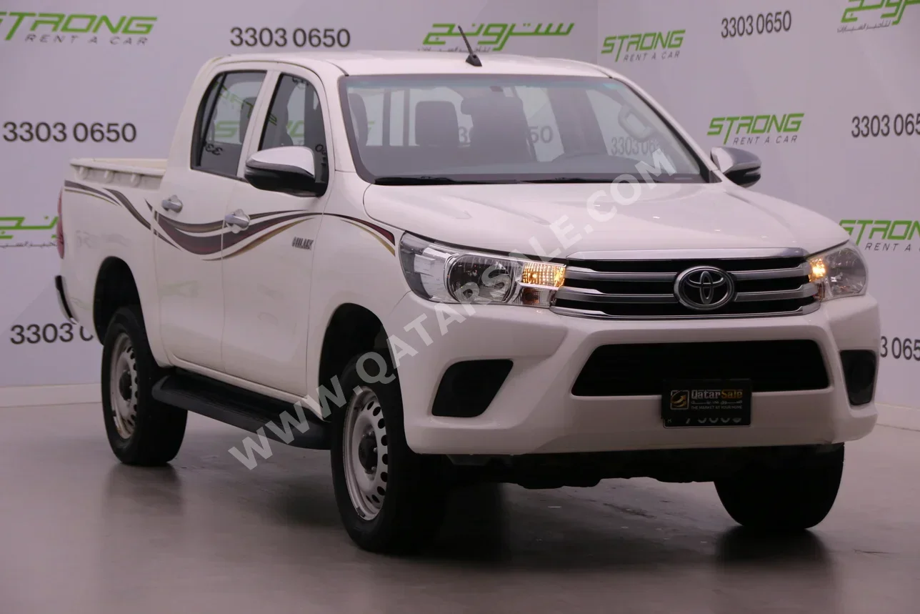 Toyota  Hilux  2019  Automatic  18,000 Km  4 Cylinder  Four Wheel Drive (4WD)  Pick Up  White
