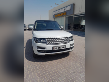 Land Rover  Range Rover  Vogue SE Super charged  2013  Automatic  207,000 Km  8 Cylinder  Four Wheel Drive (4WD)  SUV  White