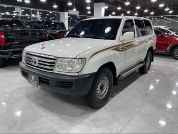 Toyota  Land Cruiser  GX  2006  Manual  312,000 Km  6 Cylinder  Four Wheel Drive (4WD)  SUV  White