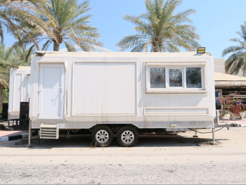 Caravan - 2015  - White  -Made in Qatar
