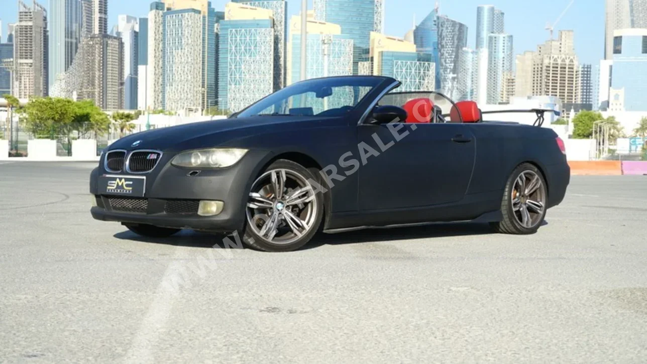 BMW  3-Series  320i  2009  Automatic  78,000 Km  4 Cylinder  Rear Wheel Drive (RWD)  Convertible  Black Matte