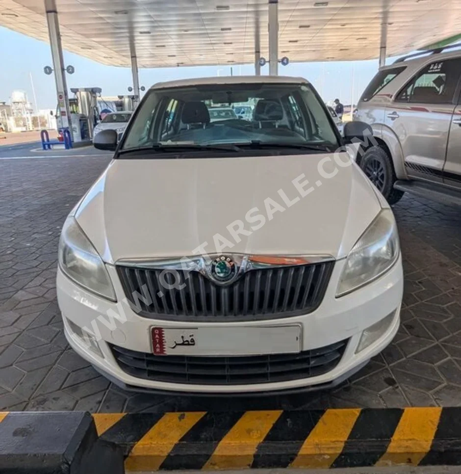 Skoda  Fabia  2013  Automatic  149,650 Km  4 Cylinder  Front Wheel Drive (FWD)  Hatchback  White