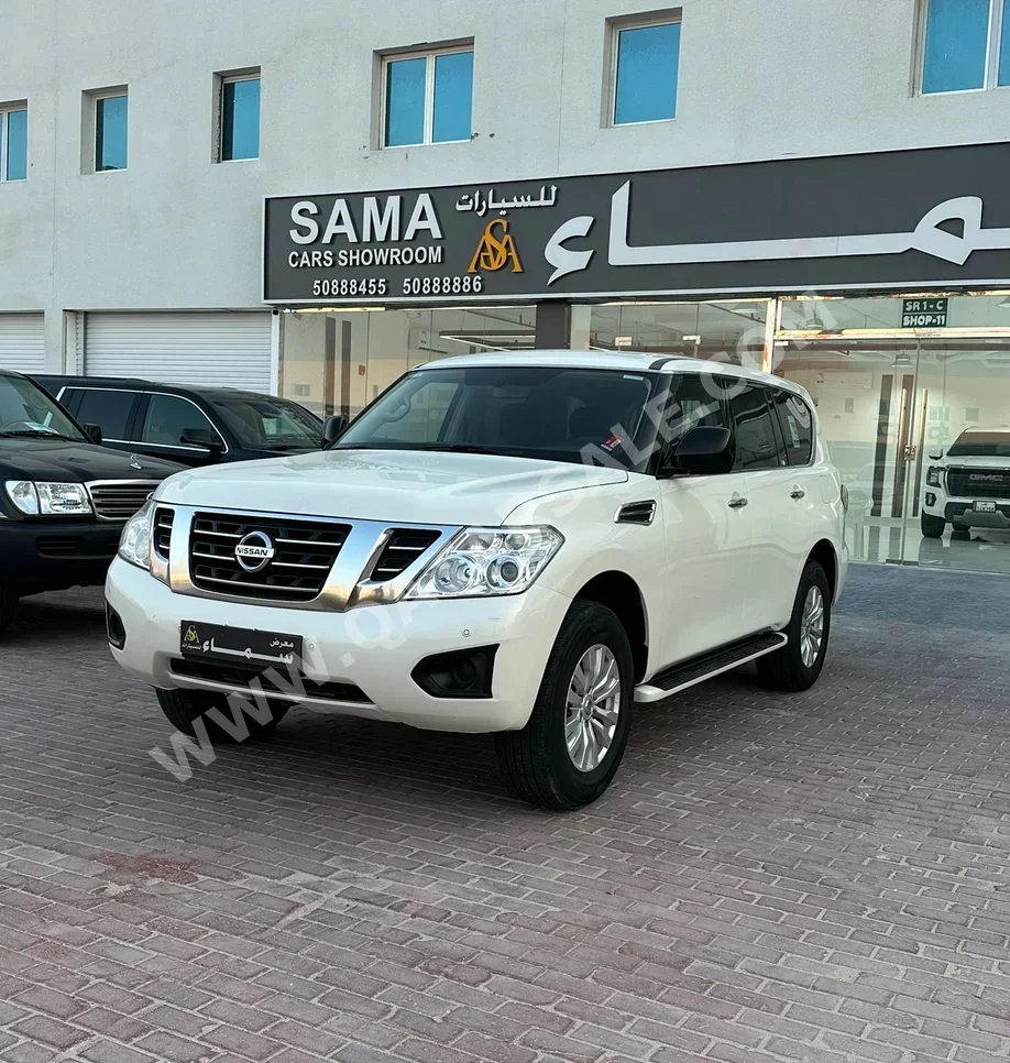 Nissan  Patrol  XE  2018  Automatic  180,000 Km  6 Cylinder  Four Wheel Drive (4WD)  SUV  White