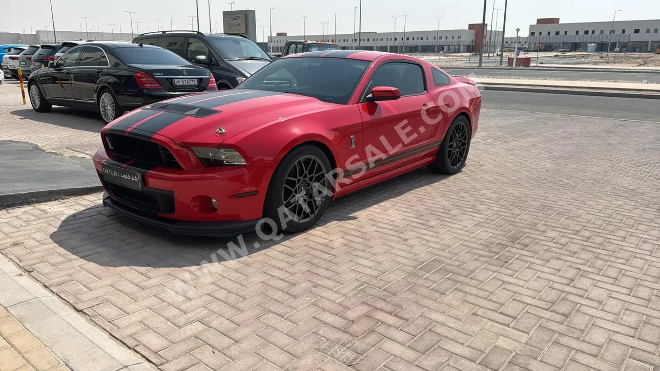 Ford  Mustang  Shelby  2014  Automatic  49,000 Km  8 Cylinder  Rear Wheel Drive (RWD)  Coupe / Sport  Red