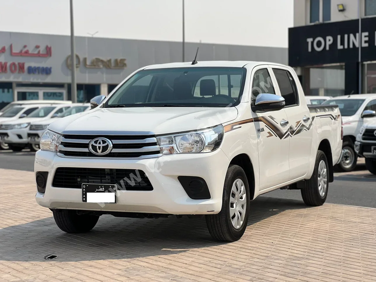 Toyota  Hilux  2024  Manual  60,000 Km  4 Cylinder  Four Wheel Drive (4WD)  Pick Up  White  With Warranty