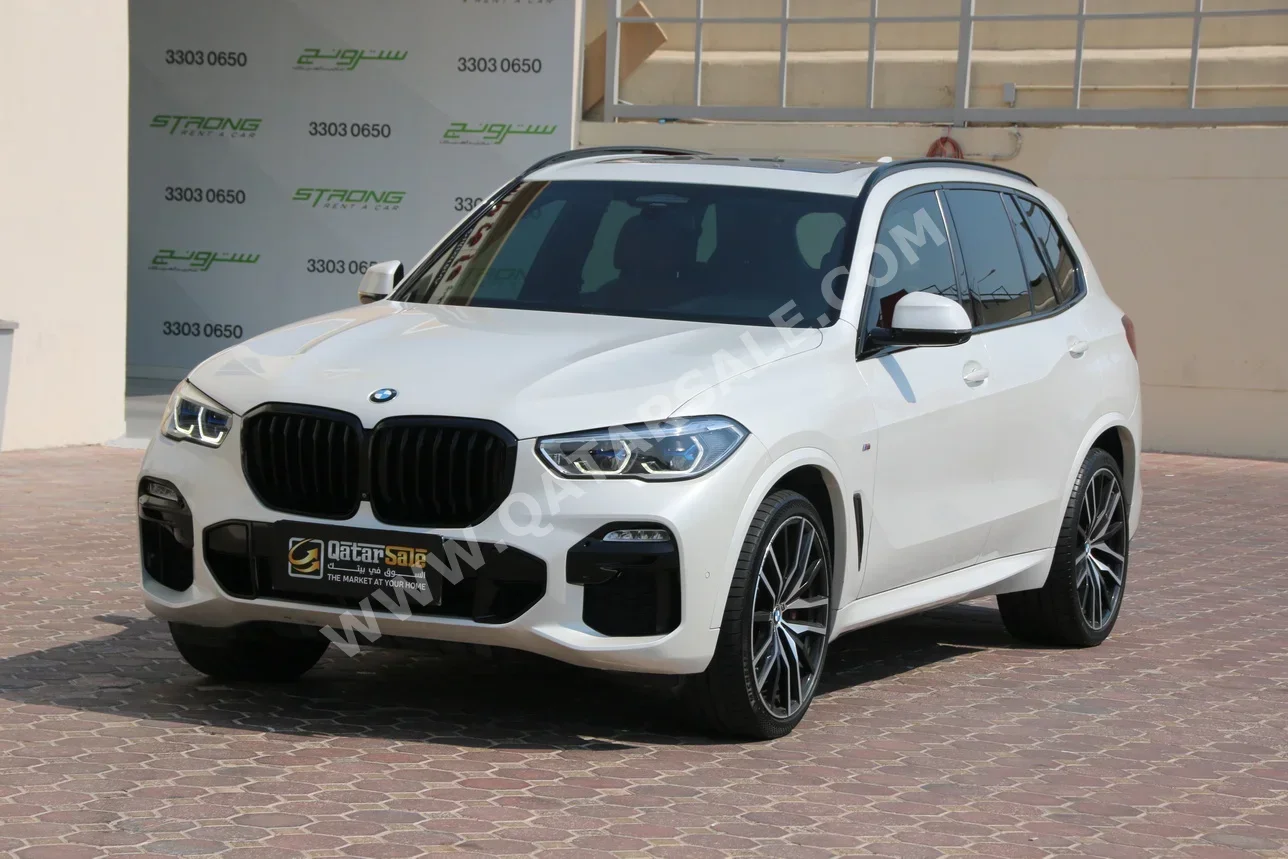 BMW  X-Series  X5 XDrive 50i  2021  Automatic  47,000 Km  8 Cylinder  Four Wheel Drive (4WD)  SUV  White  With Warranty