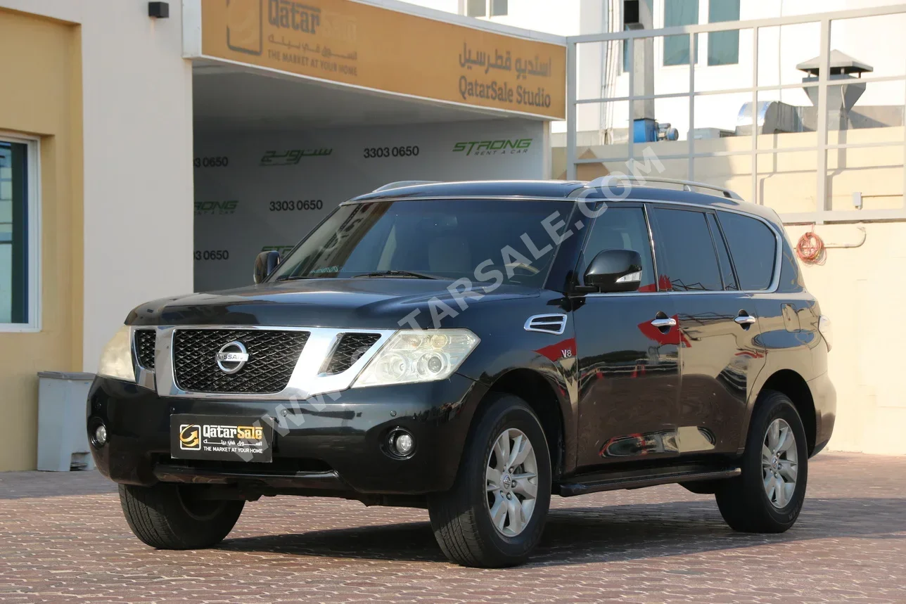 Nissan  Patrol  SE  2013  Automatic  256,000 Km  8 Cylinder  Four Wheel Drive (4WD)  SUV  Black