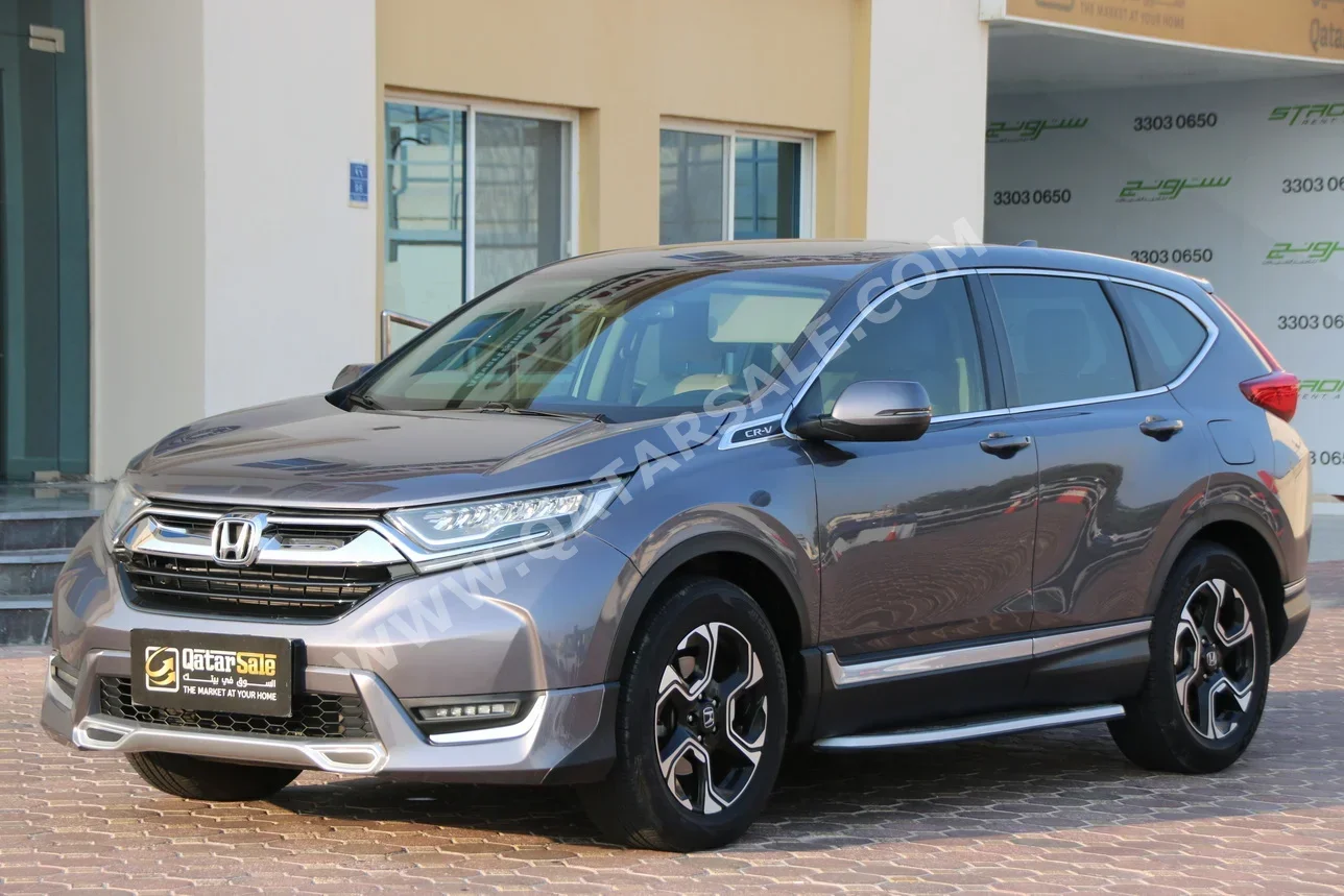 Honda  CRV  Touring  2019  Automatic  185,000 Km  4 Cylinder  All Wheel Drive (AWD)  SUV  Gray