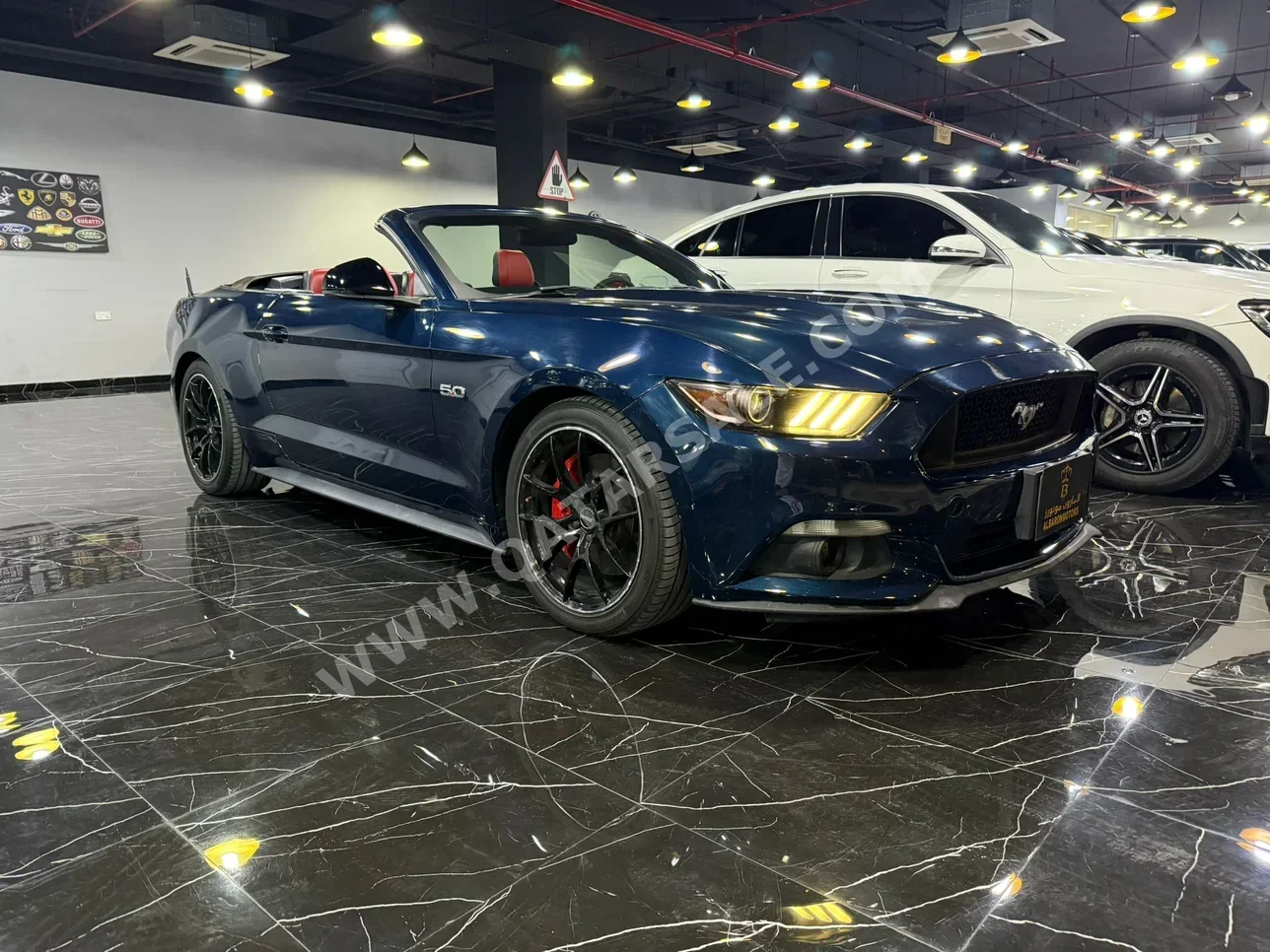 Ford  Mustang  GT  2015  Automatic  180,000 Km  8 Cylinder  Rear Wheel Drive (RWD)  Convertible  Dark Blue