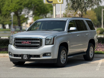 GMC  Yukon  SLE  2015  Automatic  193,000 Km  8 Cylinder  Four Wheel Drive (4WD)  SUV  Silver