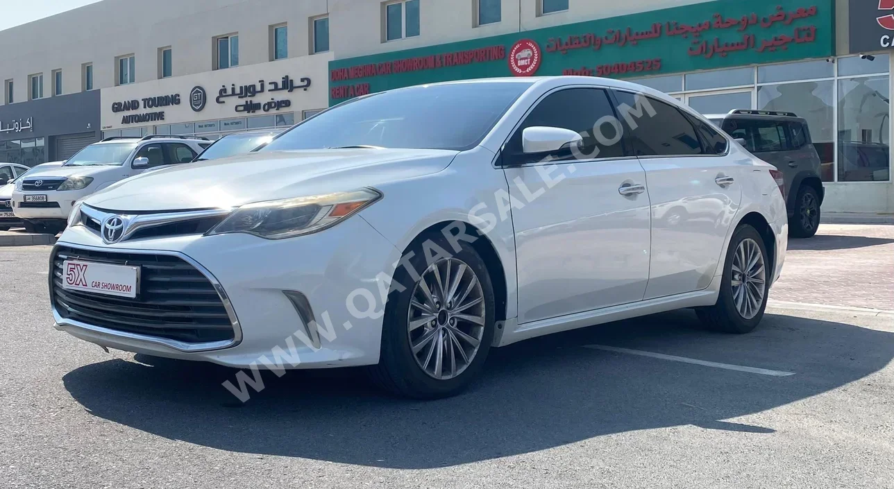 تويوتا  أفالون  لمتيد  2016  اوتوماتيك  239,000 كم  6 سلندر  سحب امامي  سيدان  أبيض