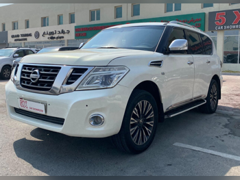 Nissan  Patrol  Platinum  2014  Automatic  358,000 Km  8 Cylinder  Four Wheel Drive (4WD)  SUV  White