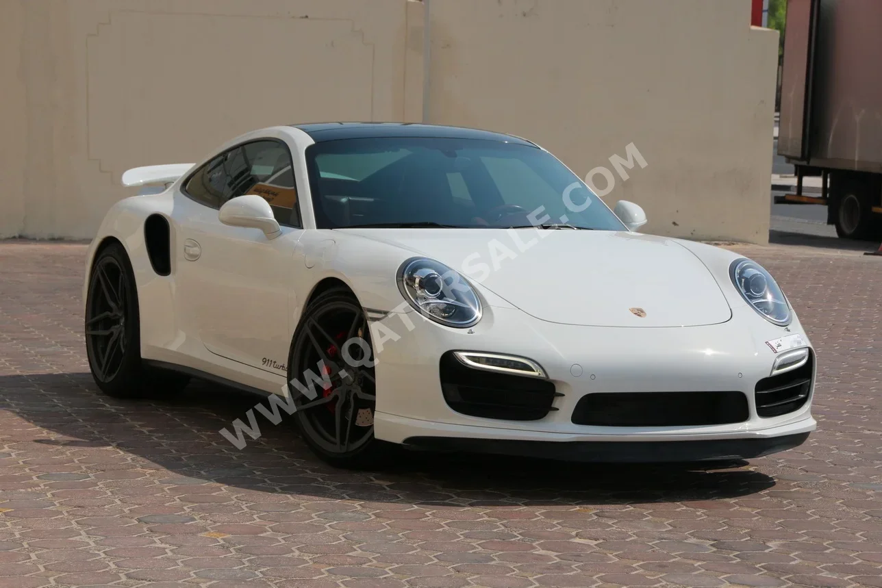 بورش  911  توربو  2014  اوتوماتيك  92,000 كم  6 سلندر  دفع خلفي  كوبيه \ سبورت  أبيض  تحت الضمان