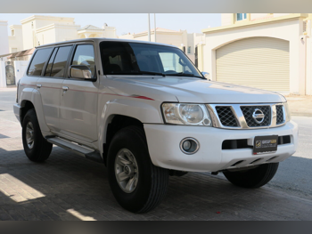 Nissan  Patrol  Safari  2014  Manual  224,000 Km  6 Cylinder  Four Wheel Drive (4WD)  SUV  White
