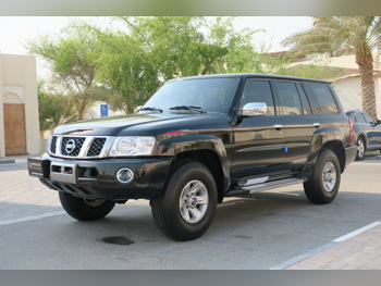 Nissan  Patrol  Safari  2023  Manual  18,000 Km  6 Cylinder  Four Wheel Drive (4WD)  SUV  Black  With Warranty