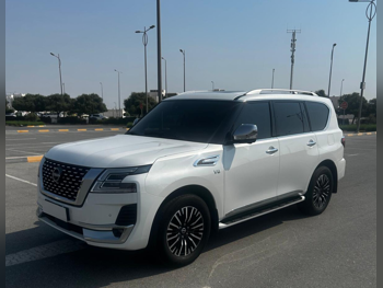 Nissan  Patrol  Platinum  2022  Automatic  79,000 Km  8 Cylinder  Four Wheel Drive (4WD)  SUV  White