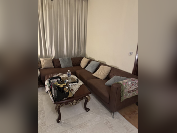 الأرائك والكنب والكراسي هوم سينتر  كنبة زاوية  - جلد صناعي  - بني