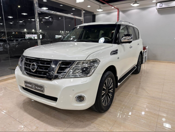 Nissan  Patrol  Platinum  2015  Automatic  210,000 Km  8 Cylinder  Four Wheel Drive (4WD)  SUV  White