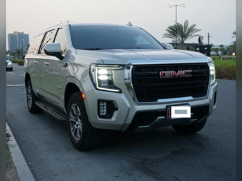 GMC  Yukon  XL  2023  Automatic  120,000 Km  8 Cylinder  Four Wheel Drive (4WD)  SUV  Gold