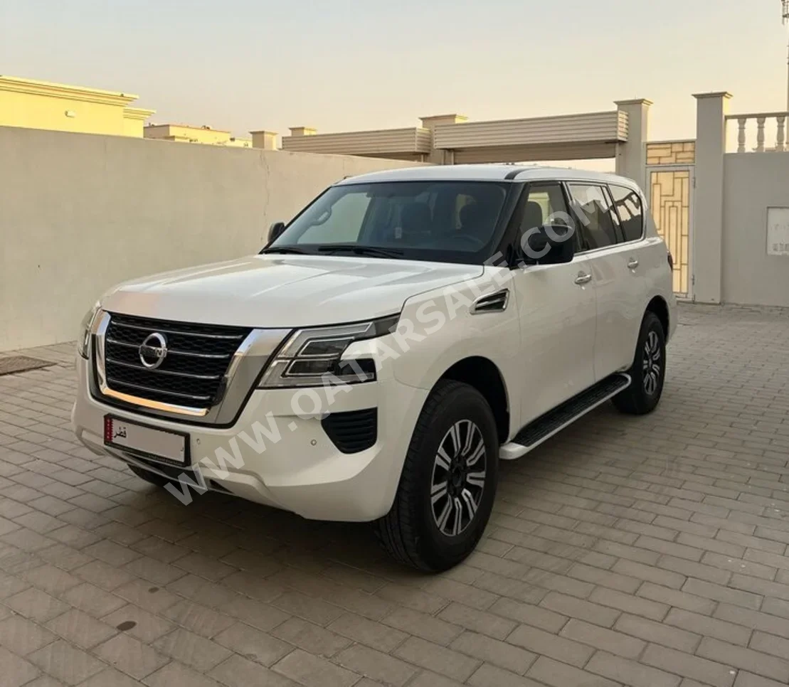 Nissan  Patrol  XE  2020  Automatic  143,000 Km  6 Cylinder  Four Wheel Drive (4WD)  SUV  Pearl  With Warranty