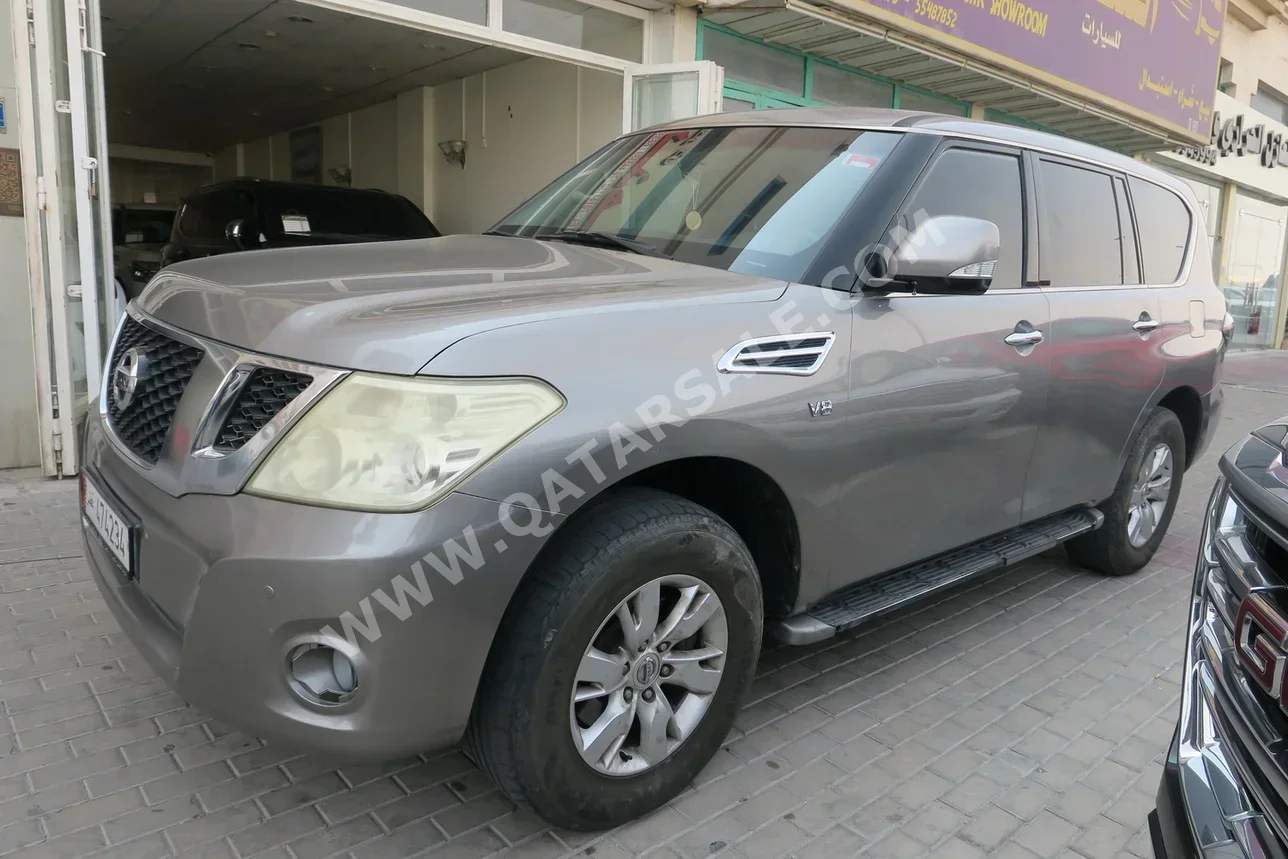 Nissan  Patrol  SE  2012  Automatic  280,000 Km  8 Cylinder  Four Wheel Drive (4WD)  SUV  Gray