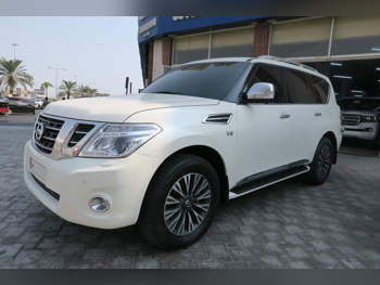 Nissan  Patrol  Platinum  2014  Automatic  177,000 Km  8 Cylinder  Four Wheel Drive (4WD)  SUV  White