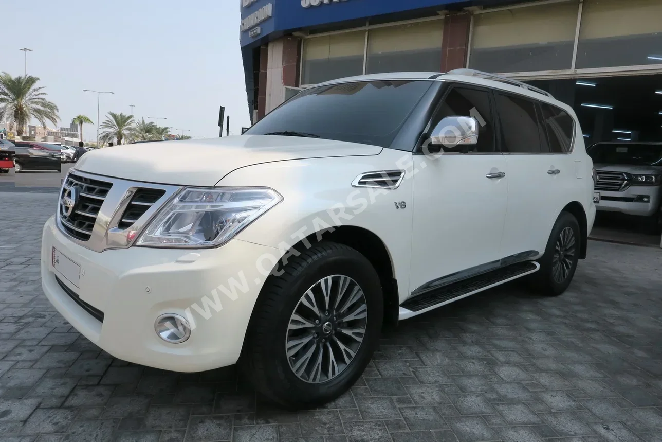 Nissan  Patrol  Platinum  2014  Automatic  177,000 Km  8 Cylinder  Four Wheel Drive (4WD)  SUV  White