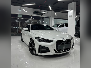 BMW  4-Series  420 I  2024  Automatic  48,000 Km  4 Cylinder  Rear Wheel Drive (RWD)  Coupe / Sport  White  With Warranty