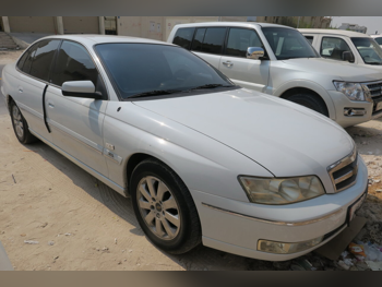 Chevrolet  Caprice  2005  Automatic  63,000 Km  6 Cylinder  Rear Wheel Drive (RWD)  Sedan  White