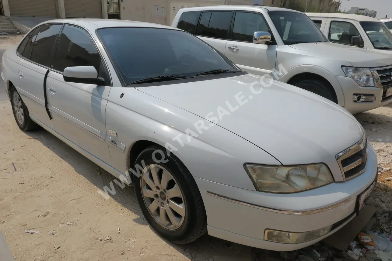 Chevrolet  Caprice  2005  Automatic  63,000 Km  6 Cylinder  Rear Wheel Drive (RWD)  Sedan  White