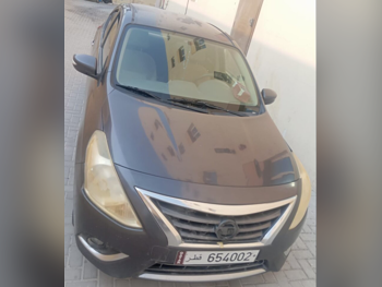 Nissan  Sunny  2015  Automatic  401,694 Km  4 Cylinder  Sedan  Gray