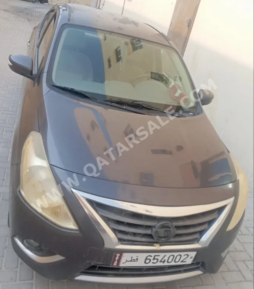Nissan  Sunny  2015  Automatic  401,694 Km  4 Cylinder  Sedan  Gray