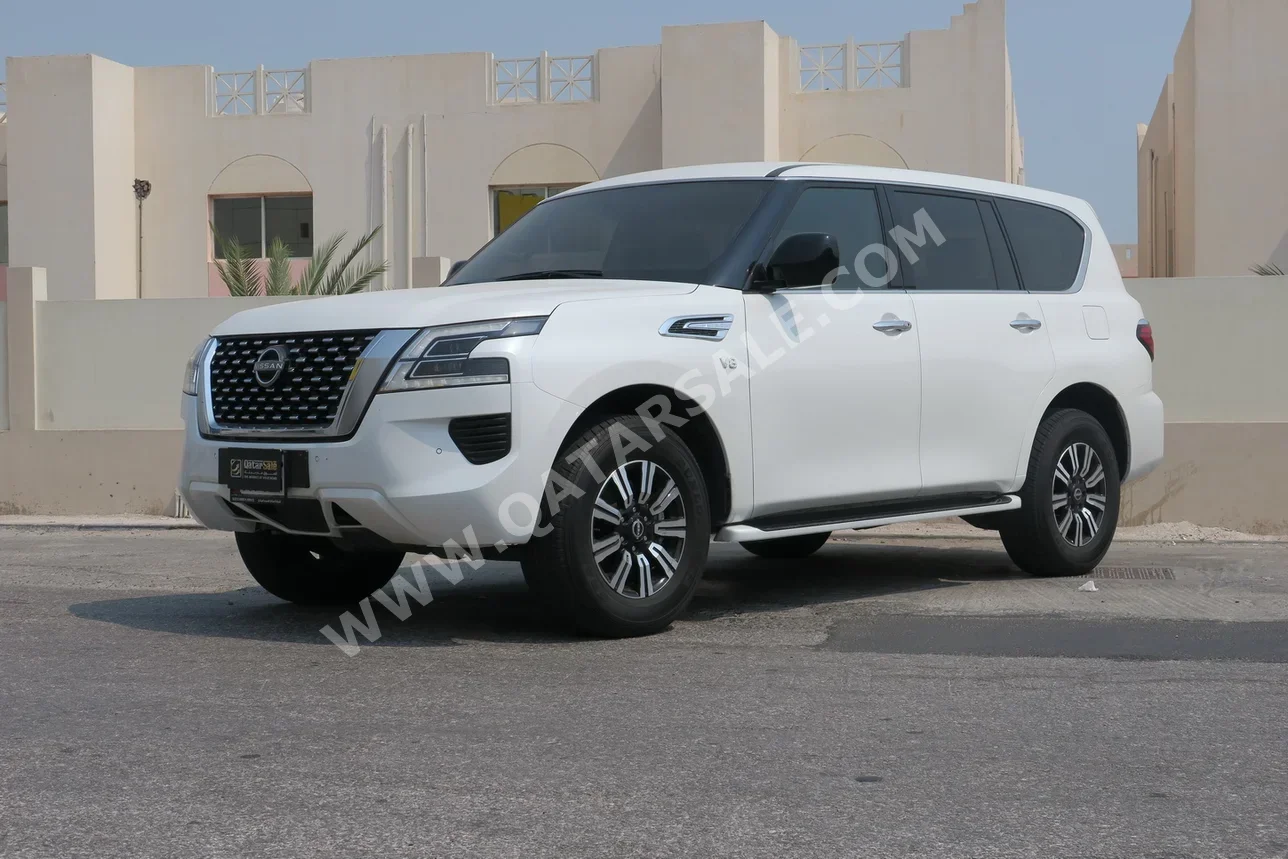 Nissan  Patrol  XE  2024  Automatic  32,800 Km  8 Cylinder  Four Wheel Drive (4WD)  SUV  White  With Warranty