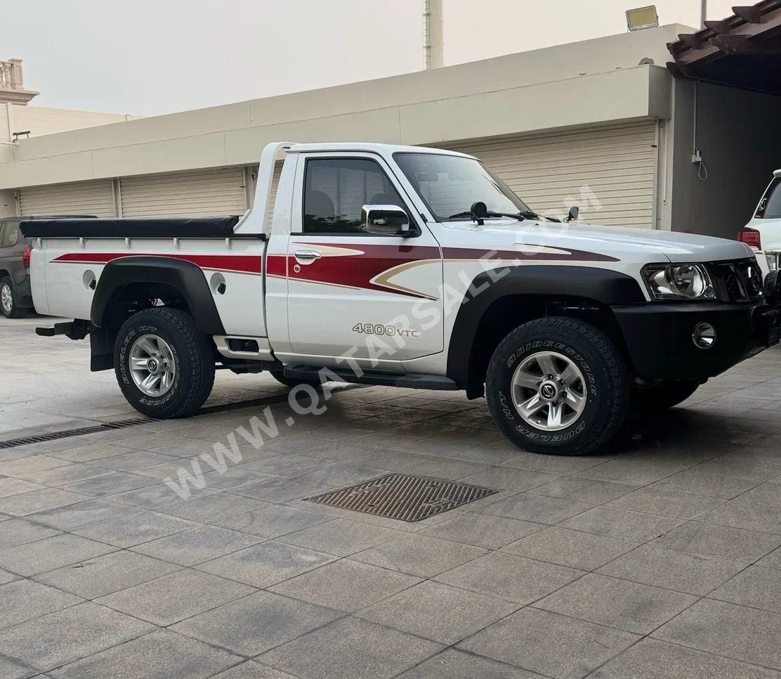 Nissan  Patrol  Pickup  2021  Manual  16,500 Km  6 Cylinder  Four Wheel Drive (4WD)  Pick Up  White  With Warranty