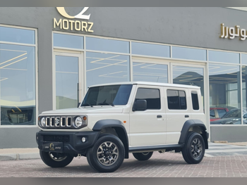 Suzuki  Jimny  2024  Automatic  25,000 Km  4 Cylinder  Four Wheel Drive (4WD)  SUV  White  With Warranty