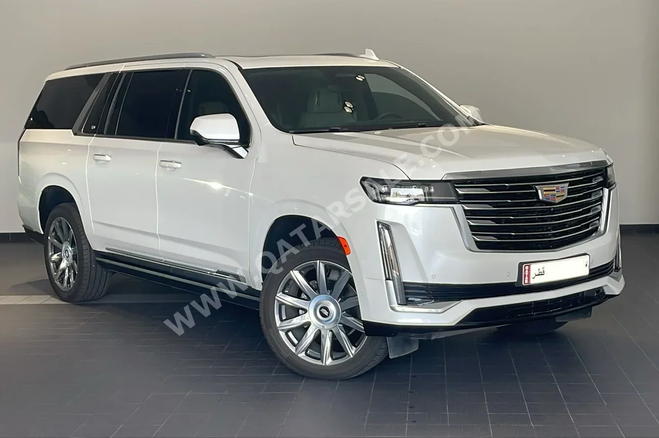 Cadillac  Escalade  Platinum  2024  Automatic  13,000 Km  8 Cylinder  Four Wheel Drive (4WD)  SUV  White  With Warranty