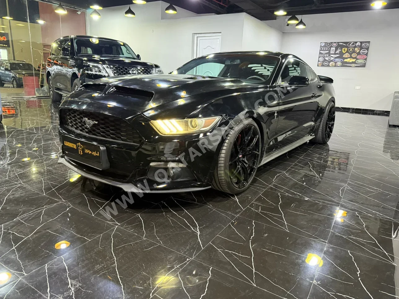 Ford  Mustang  Ecoboost  2015  Automatic  173,000 Km  4 Cylinder  Rear Wheel Drive (RWD)  Coupe / Sport  Black