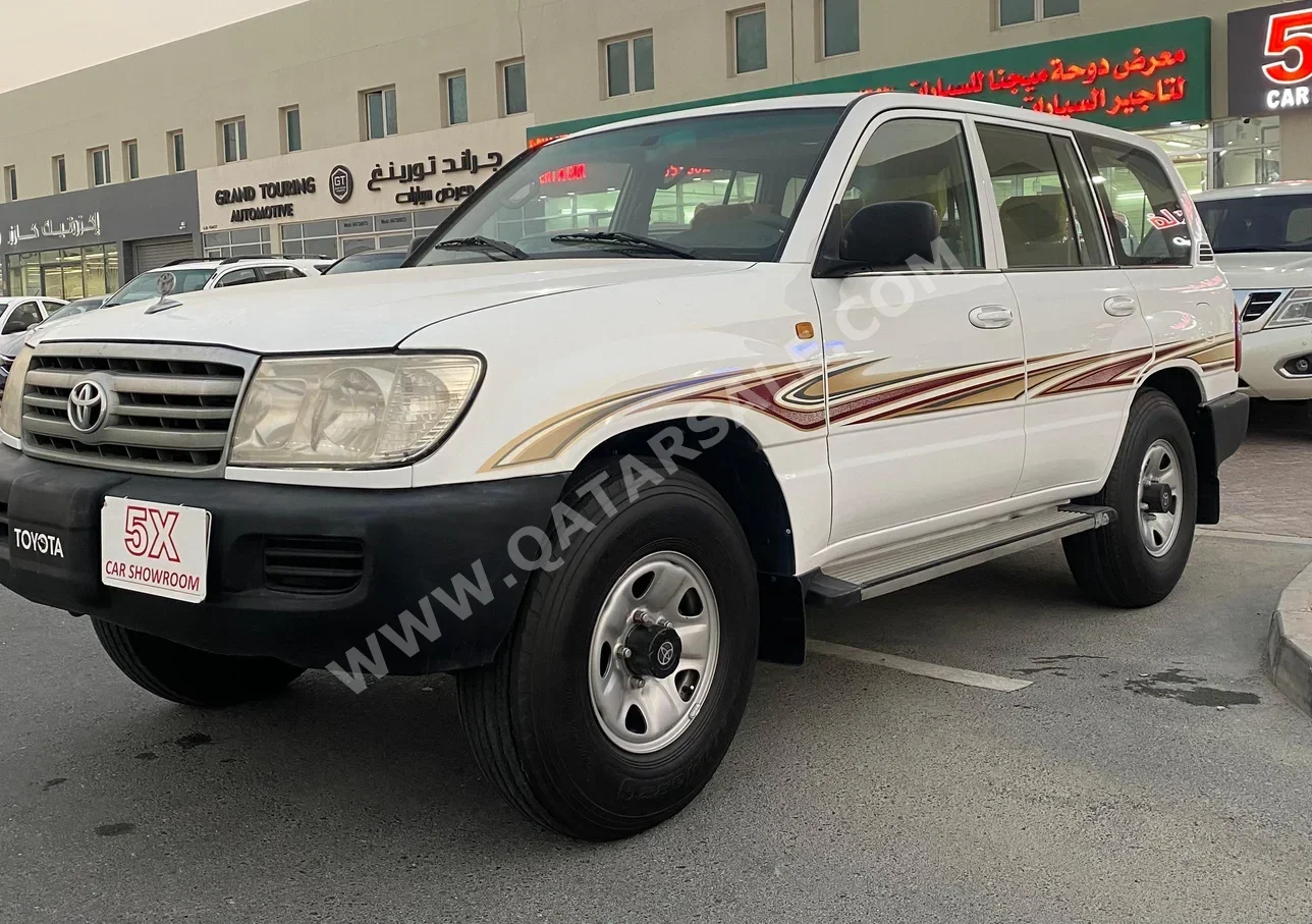 Toyota  Land Cruiser  GX  2006  Manual  388,000 Km  6 Cylinder  Four Wheel Drive (4WD)  SUV  White