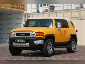 Toyota  FJ Cruiser  2015  Automatic  100,000 Km  6 Cylinder  Four Wheel Drive (4WD)  SUV  Yellow