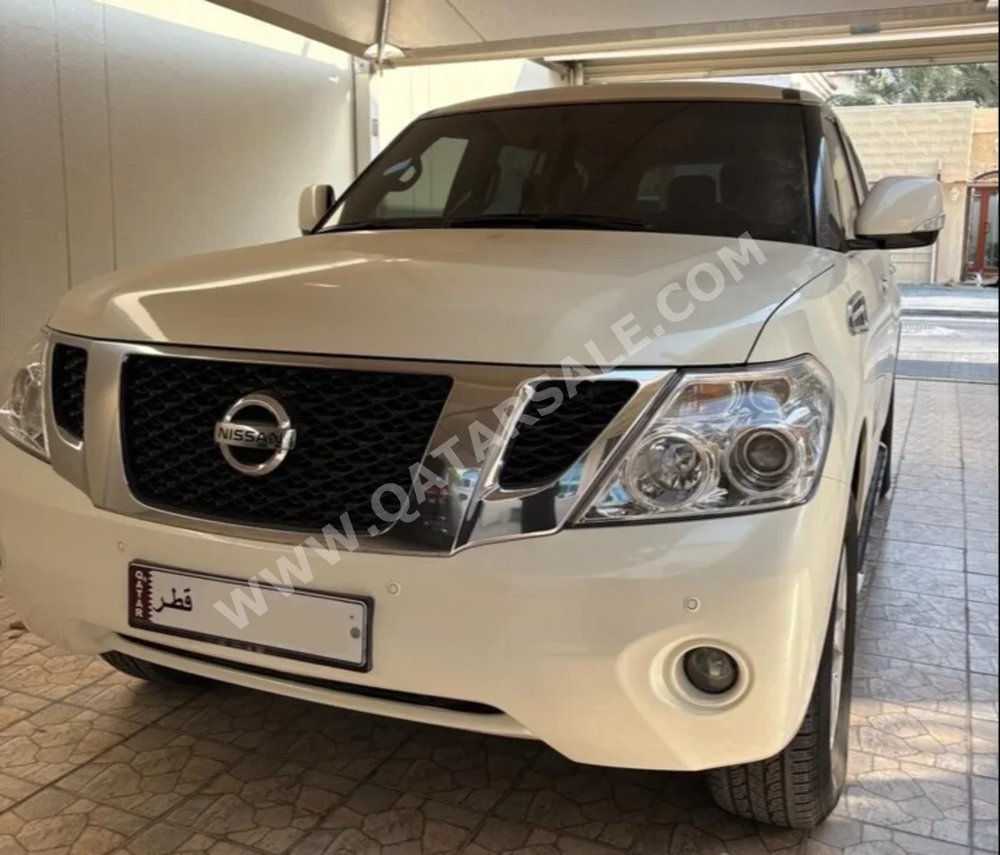Nissan Patrol SE 2011 Automatic 276,000 Km 8 Cylinder Four Wheel Drive (4WD) SUV Pearl