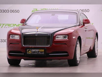 Rolls-Royce  Wraith  2014  Automatic  114,000 Km  12 Cylinder  All Wheel Drive (AWD)  Coupe / Sport  Black and Red
