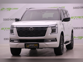 Nissan  Patrol  Platinum  2025  Automatic  22,000 Km  6 Cylinder  Four Wheel Drive (4WD)  SUV  White  With Warranty