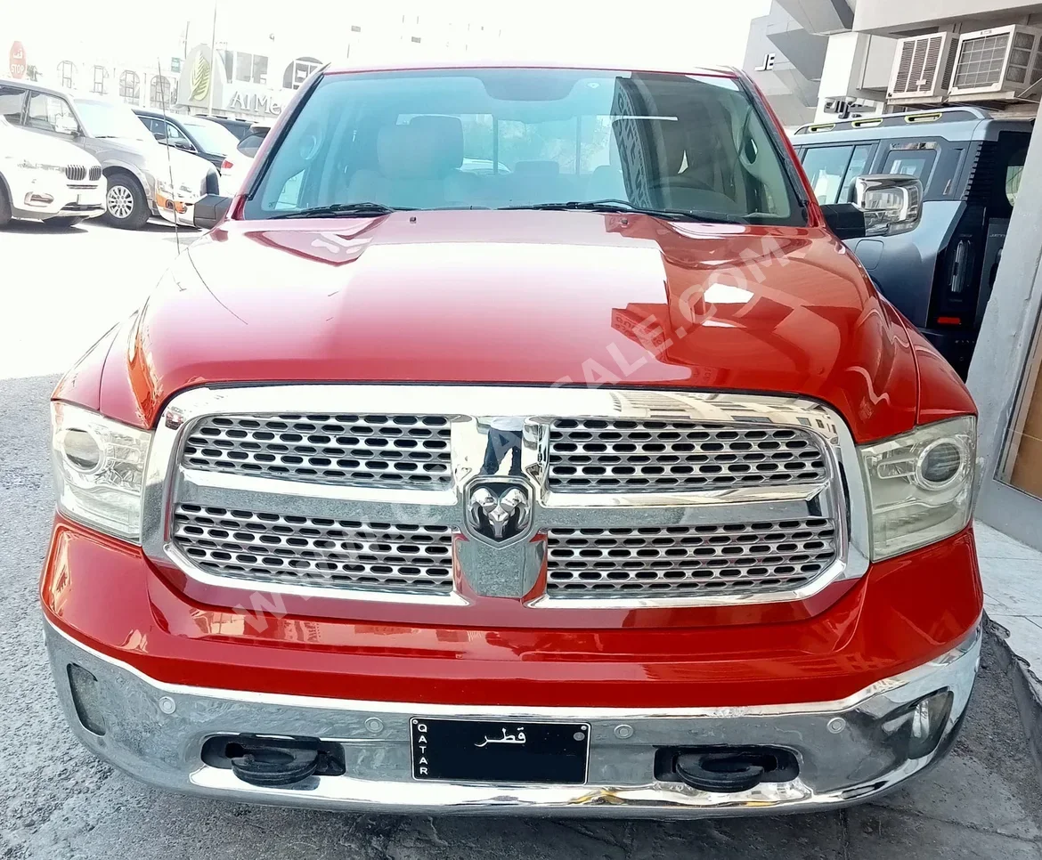 Dodge  Ram  1500  2015  Automatic  289,000 Km  8 Cylinder  Four Wheel Drive (4WD)  Pick Up  Red