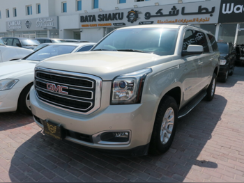 GMC  Yukon  XL  2016  Automatic  132,000 Km  8 Cylinder  Rear Wheel Drive (RWD)  SUV  Gold