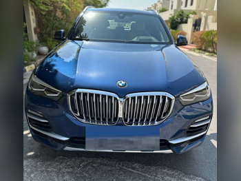 BMW  X-Series  X5 XDrive 40i  2019  Tiptronic  56,000 Km  6 Cylinder  All Wheel Drive (AWD)  SUV  Blue  With Warranty