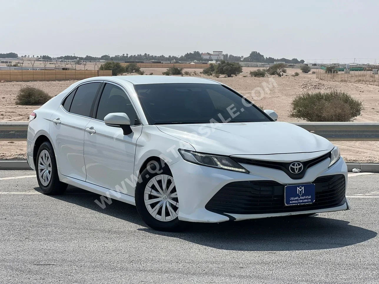 Toyota  Camry  LE  2018  Automatic  145,649 Km  4 Cylinder  Front Wheel Drive (FWD)  Sedan  White