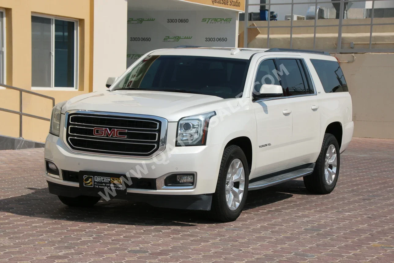GMC  Yukon  XL SLT  2015  Automatic  204,000 Km  8 Cylinder  Four Wheel Drive (4WD)  SUV  Pearl