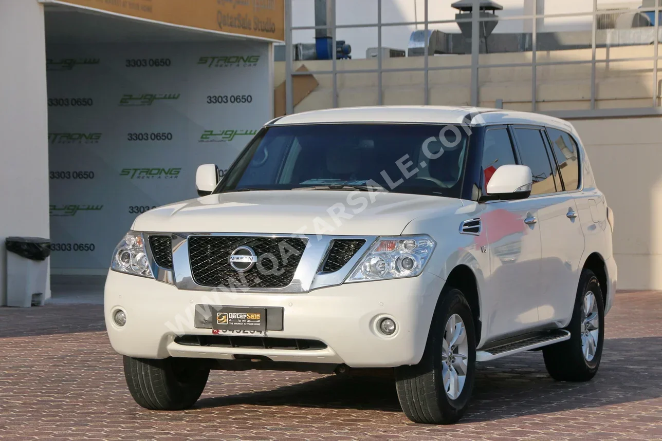 نيسان  باترول  اس اي  2013  اوتوماتيك  210,000 كم  8 سلندر  دفع رباعي  اس يو في  أبيض