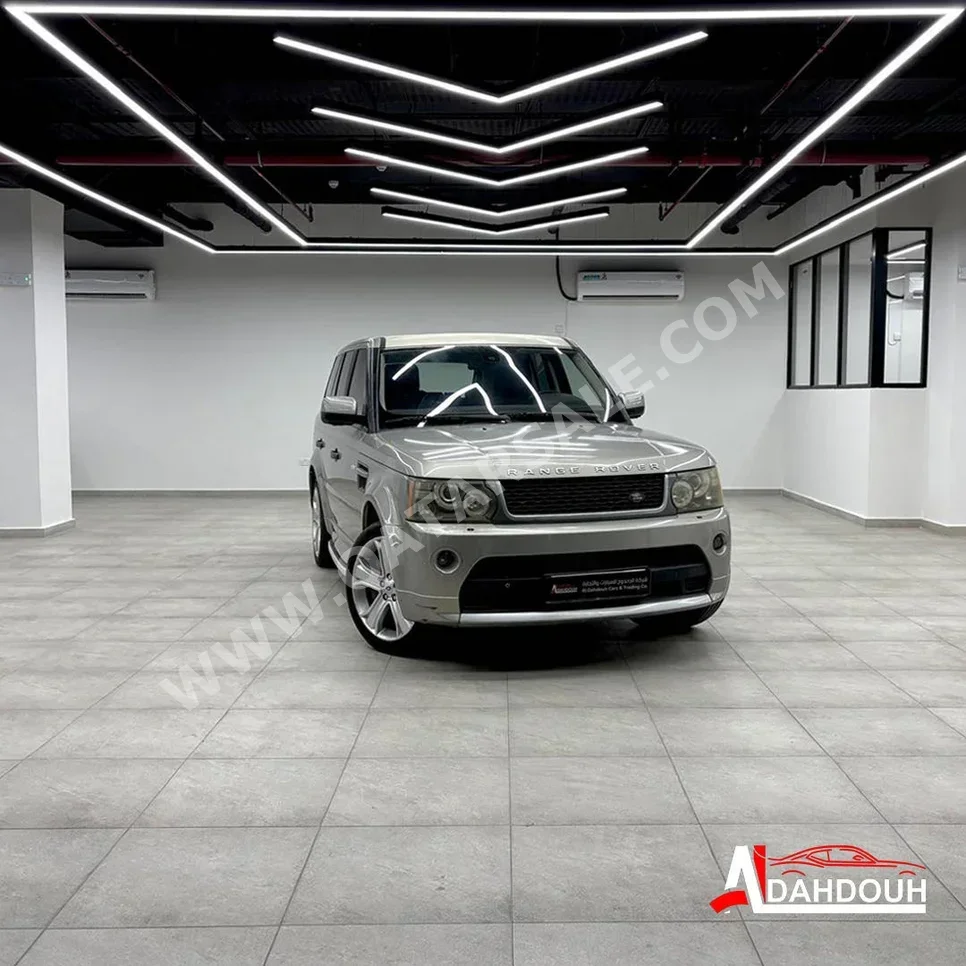Land Rover  Range Rover  Sport  2011  Automatic  143,000 Km  8 Cylinder  Four Wheel Drive (4WD)  SUV  Gold