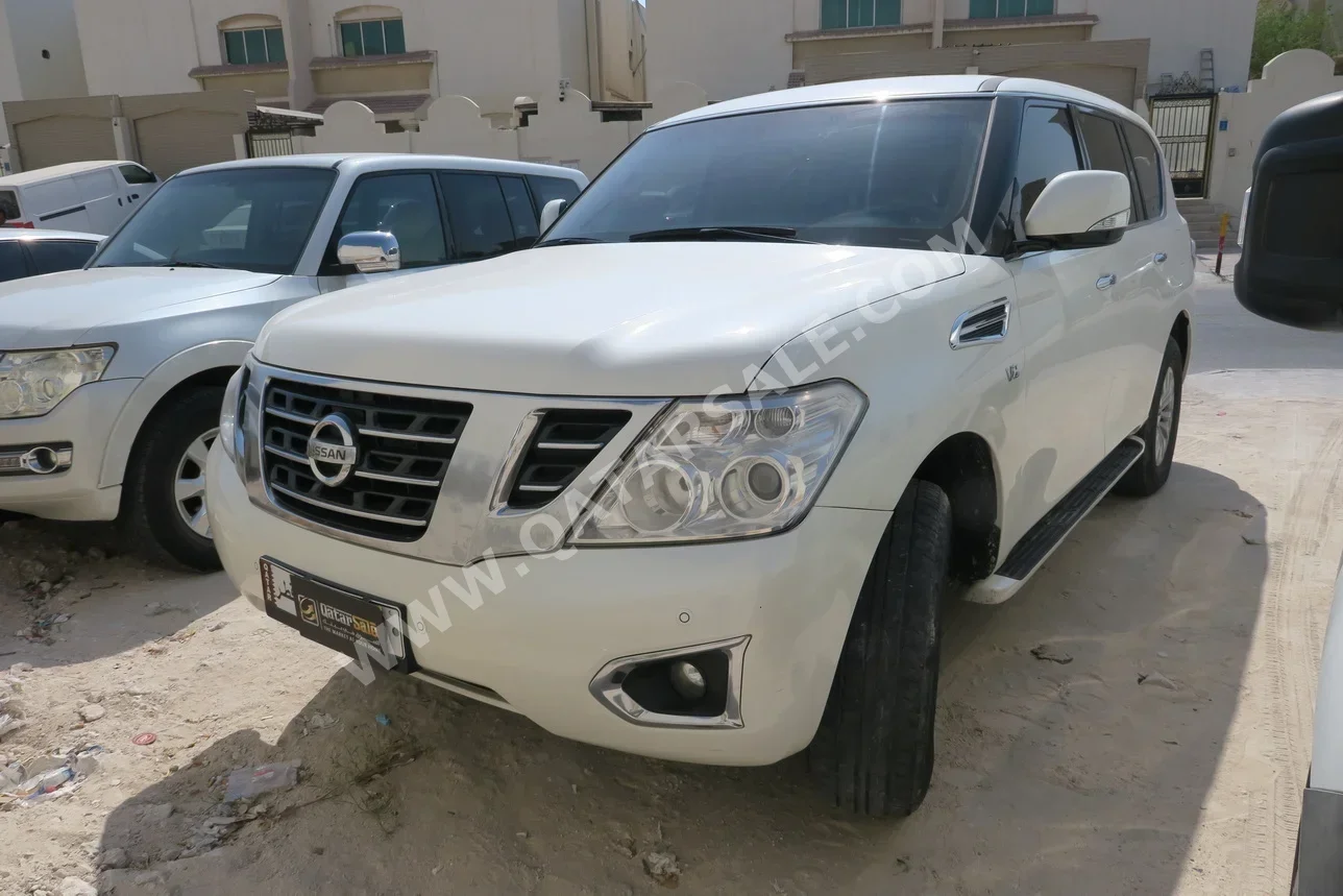 نيسان باترول أكس أي 2016 اوتوماتيك 210,000 كم 6 سلندر دفع رباعي اس يو في أبيض